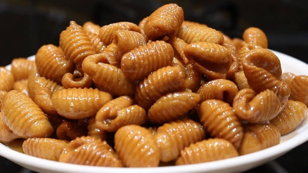 Bellam Gavvalu (Andhra Style Jaggery Sweet Shells)